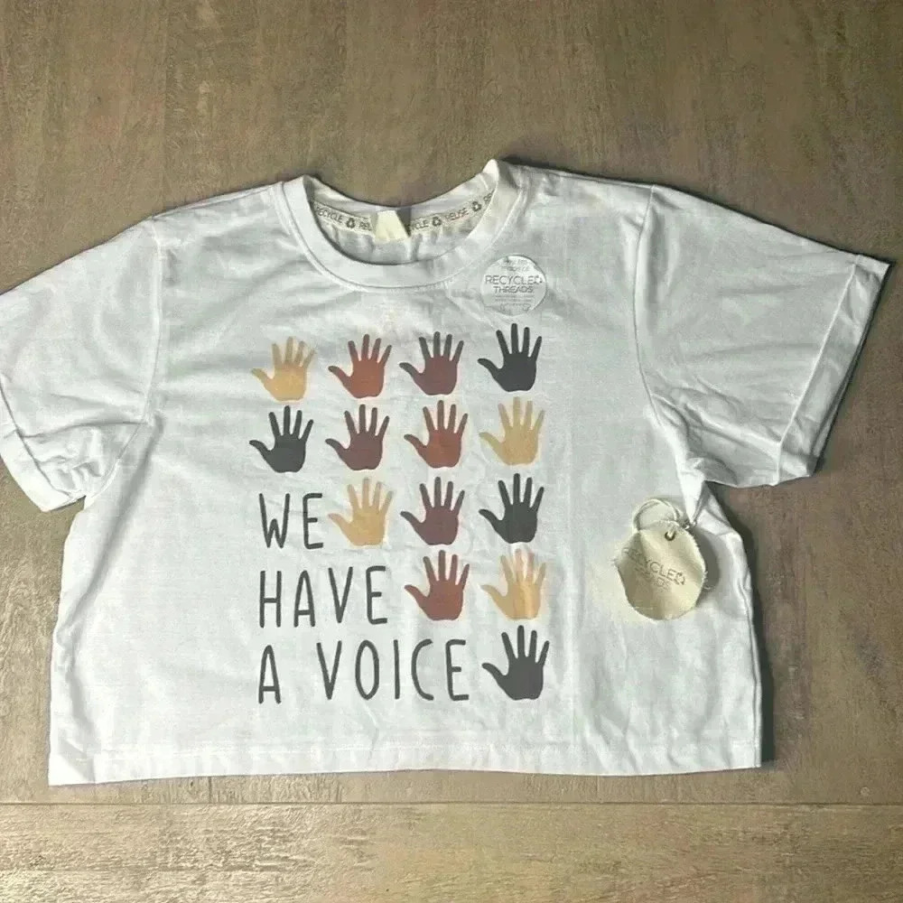 Recycled threads cropped t-shirt size Medium.  “We have a voice “